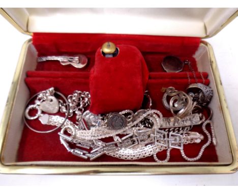 A jewellery box containing silver jewellery including bracelets, coin bracelet, rings, pendant on chain, baby bangle etc.