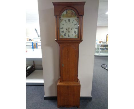 An early 19th century oak longcase clock with painted dial signed T Pape, Rothbury 