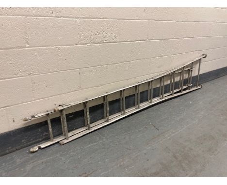 A metal extension ladder 