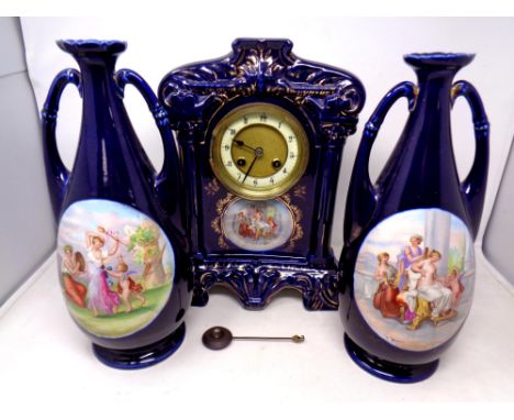 A three piece 19th century ceramic clock garniture 