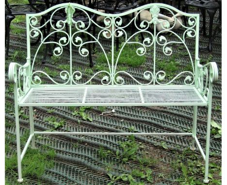 A contemporary light steel green painted two seat garden bench with folding framework, slatted seat, scrolled arms and decora