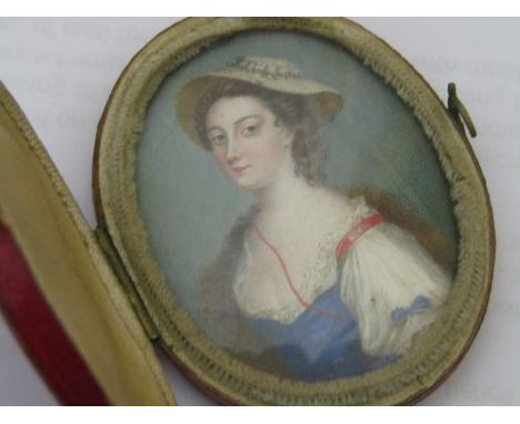 18th century British school, fine quality half length miniature portrait study of a young woman in blue dress, flower trimmed