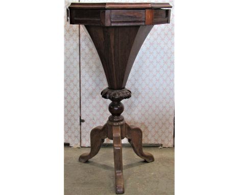 A Victorian rosewood veneered trumpet shaped sewing table/work box, the octagonal top with hinged lid and segmented interior 