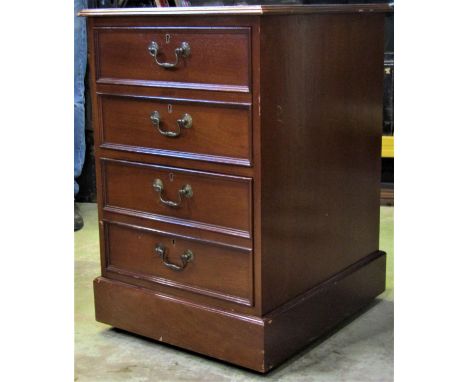 A two drawer mahogany pedestal filing cabinet in the Georgian style, the front elevation disguised as four long drawers (two 