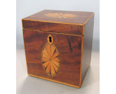 A Georgian mahogany tea caddy of cubic form with inlaid detail 
