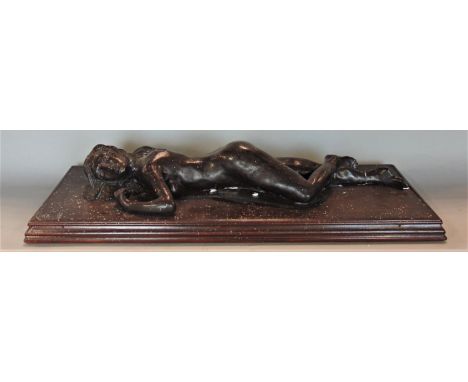 Bronzed spelter figure of a reclining nude female upon a wooden plinth base, 61 cm long (AF) 