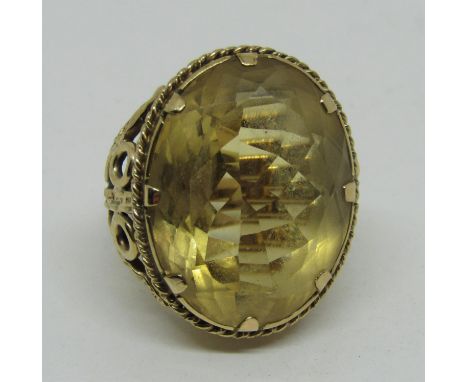 9ct oval citrine cocktail ring, size K/L, 17.5g 