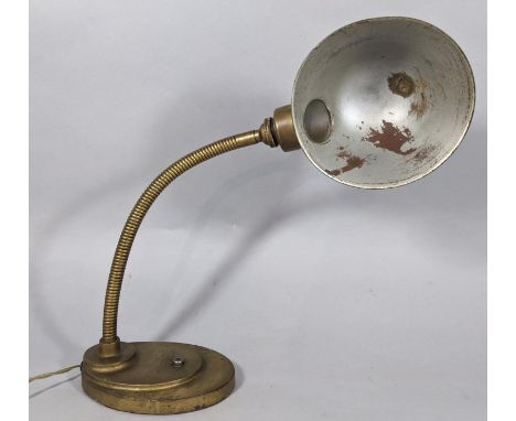 A vintage students/desk lamp with adjustable frame on a weighted and stepped base 