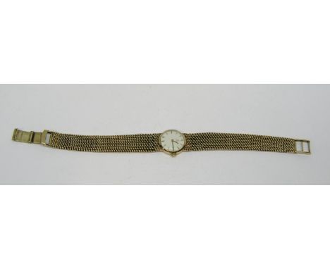 Vintage 9ct ladies Omega dress watch, the champagne dial with baton markers, 16mm dial, currently running, upon an original 9