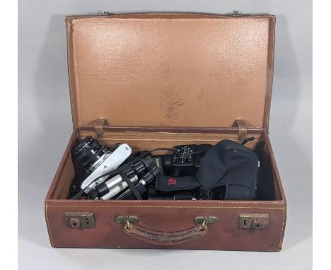 A Canon AE-1 camera, a Pentax X5 camera, additional lenses including a Pangor tele zoom example, etc 