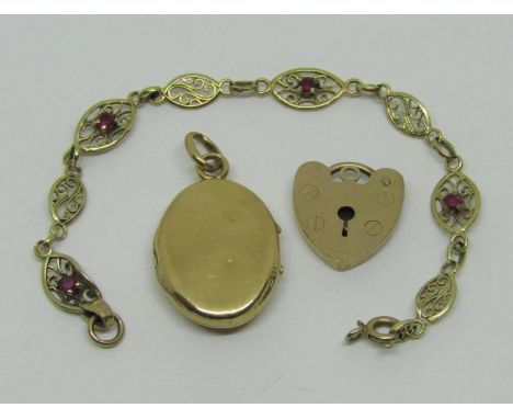 Yellow metal locket, 9ct ruby bracelet and a heart padlock clasp, 9.3g total (af) (3) 