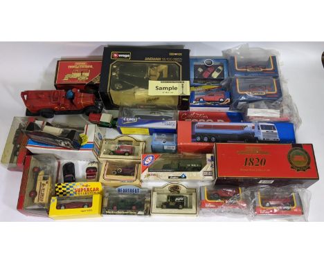 Large collection of boxed model vehicles including Burago Jaguar SS100, 17 Maisto Supercars, Corgi Rolls Royce Corniche, Matc