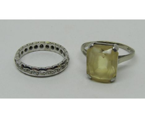 18ct citrine dress ring, size N, 3.7g and a 9ct white gold diamond eternity ring, size K/L, 2.6g (2) 