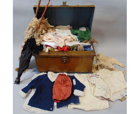 Metal trunk containing  vintage baby and dolls clothes including a 'Chilprufe' woollen gown, lace trimmed underwear etc toget