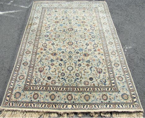 Good quality large Keshan country house carpet, with various scrolled foliage upon a light blue/turquoise ground, 370 x 230 c