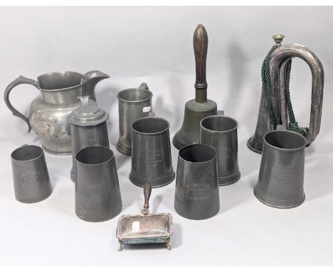 A 19th century pewter jug four pint capacity, a Victorian brass hand bell with turned wood handle, silver plated bugle and a 