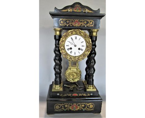 19th century portico clock, the ebonised framework inlaid with brass, with enamelled dial and eight day striking movement and