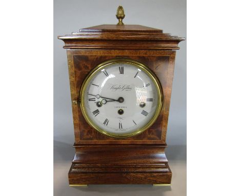 A good quality contemporary walnut bracket clock in the Georgian style, enclosing a Kieninger German movement with 9 jewels, 
