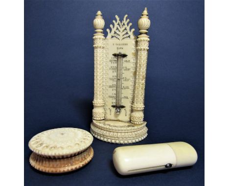 A Regency period ivory framed thermometer (glass tube AF), the surround with column supports on a demi-lune base, an early 19