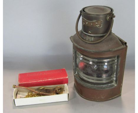 Vintage copper port marine lantern and a Bosun's whitsle 