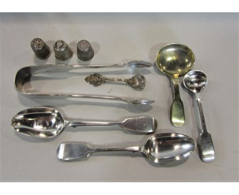 A small collection of silver plated wares to include a caddy spoon, nips, thimble (silver) 