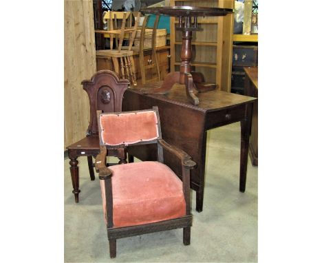 A 19th century oak single dropleaf cottage dining table with dummy end drawers and raised on four square tapered supports, to