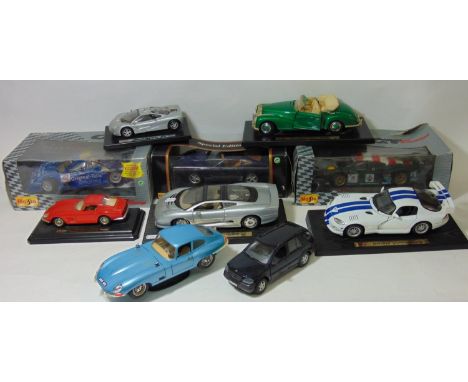 Collection of model cars by Maisto and Burago including boxed Maisto 1:18 Porsche 911 GTI, Mercedes CLK-GTR, unboxed Burago J