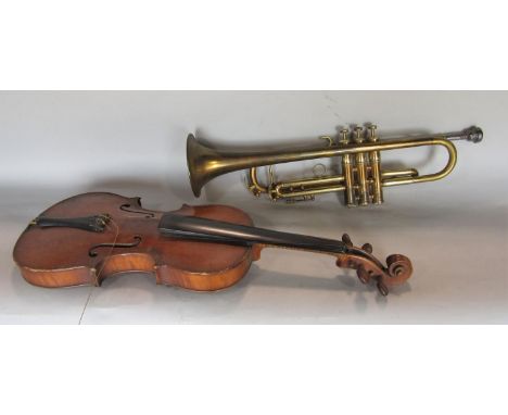 A students violin and a vintage brass trumpet 