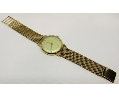Good vintage gents 9ct Jaeger Le Coultre wristwatch, with convex champagne dial and baton markers and gilt hands, original cr