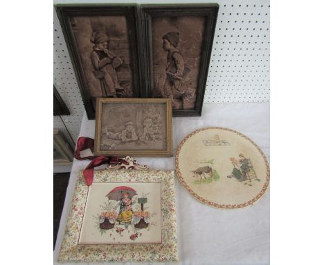 A pair of 19th century relief moulded tiles by Craven Dunnill &amp; Co Ltd, showing a boy and a girl, with embossed makers ma