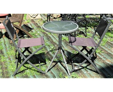 A small contemporary garden terrace table of circular form with inset glass top and coated light steel frame, together with a