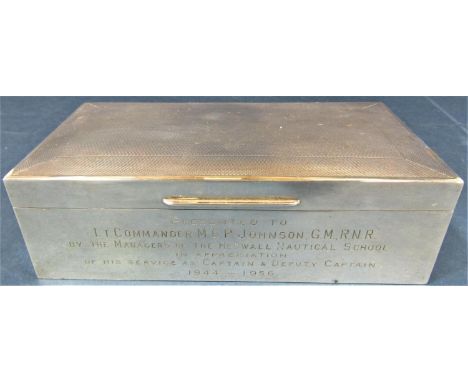 1950s silver engine turned cigarette case, the hinged lid enclosing a cedar lined interior, inscribed to the front 'Presented