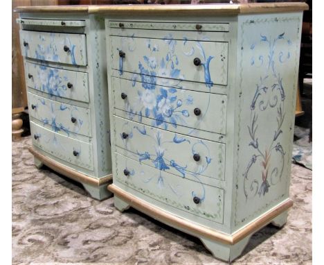 A pair of small contemporary Georgian style bow fronted bedroom chests of four long drawers beneath brushing slides with deco