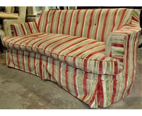 A low backed three seat sofa with shaped outline, alternating striped upholstery, raised on five square cut and tapered suppo