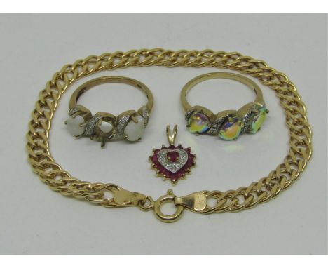 Group of 9ct jewellery comprising a flat curb link bracelet, a diamond and ruby heart pendant and two dress rings (one af), 9