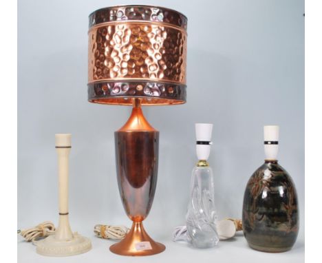 A good collection of four 20th century table / desk lamps to include an arts and craft style copper lamp,&nbsp; white bakelit