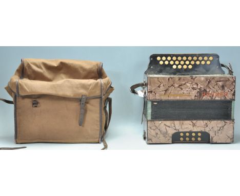 A vintage 20th Century Hohner made&nbsp;accordion having a dark pearlescent formiacia to the body with fitted leather straps.