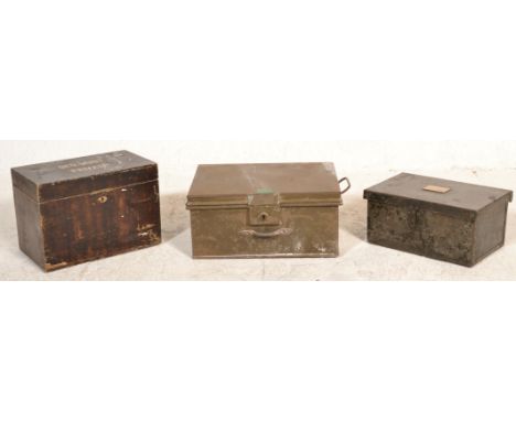 A mixed group of three boxes dating from the early 20th Century to include a green metal military example with lift out compa