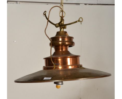 A large industrial factory style pendant lamp of modern construction in brushed gold aluminium having a large UFO saucer pend