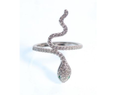A stamped 925 silver snake ring set with white and green accent stones. Weight 3.2g. Size N.5.