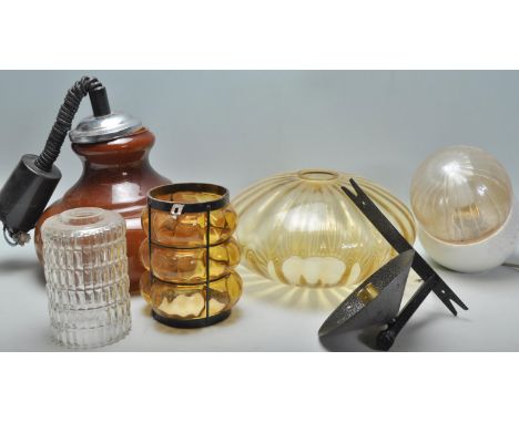 A good mix of vintage retro 20th Century glass light fitting of varying forms, styles and colours to include an orange hangin