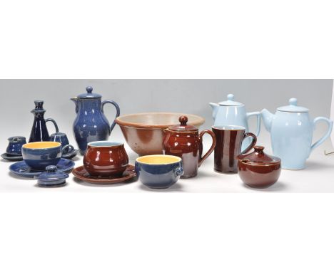 A collection of vintage retro pottery to include tea pots and coffee pots, a ceramic colander, condiment set etc. in brown an