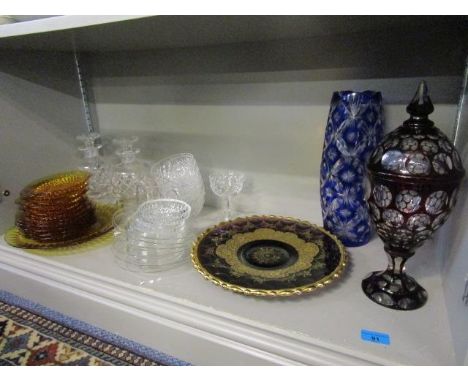 A selection of glassware to include a Bohemian ruby overlaid and cut glass vase and cover 