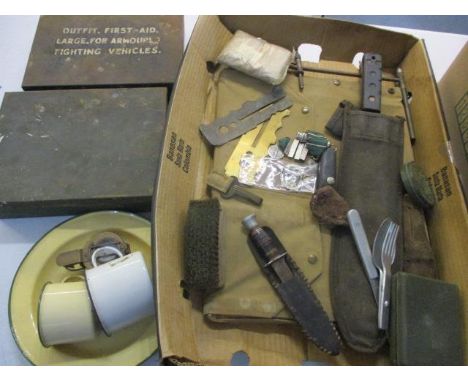 A selection of military related items to include badges, a compass, a map bag and other items 