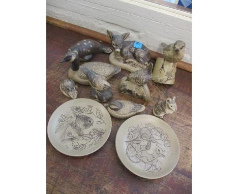 A collection of Poole animal ornaments and two dishes 