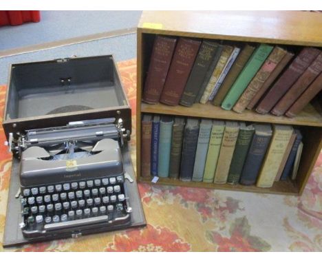 Mixed books to include one entitled Hodge and His Masters, all in an oak bookcase, together with an Imperial typewriter 