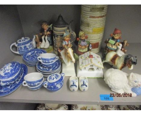 Miscellaneous ceramics to include Hummel figures, a German stein and mixed transfer decorated tankards 