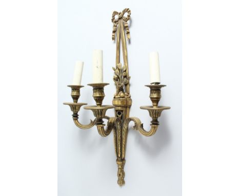 A SINGLE ORMOLU THREE LIGHT WALL APPLIQUE, with ribbon and bow finial and floral back plate. 23.5ins high x 13.5ins wide.