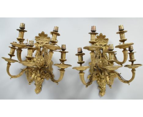 A SUPERB PAIR OF FRENCH, ORMOLU AND ENAMEL TWO LIGHT WALL SCONCES WITH ACANTHUS AND SCROLLS 22ins long, 12ins wide.
