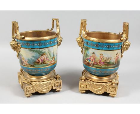 A GOOD PAIR OF SEVERS DESIGN PORCELAIN AND GILT METAL CACHE POTS painted with cymbals. 7.5ins diameter, 10ins high.